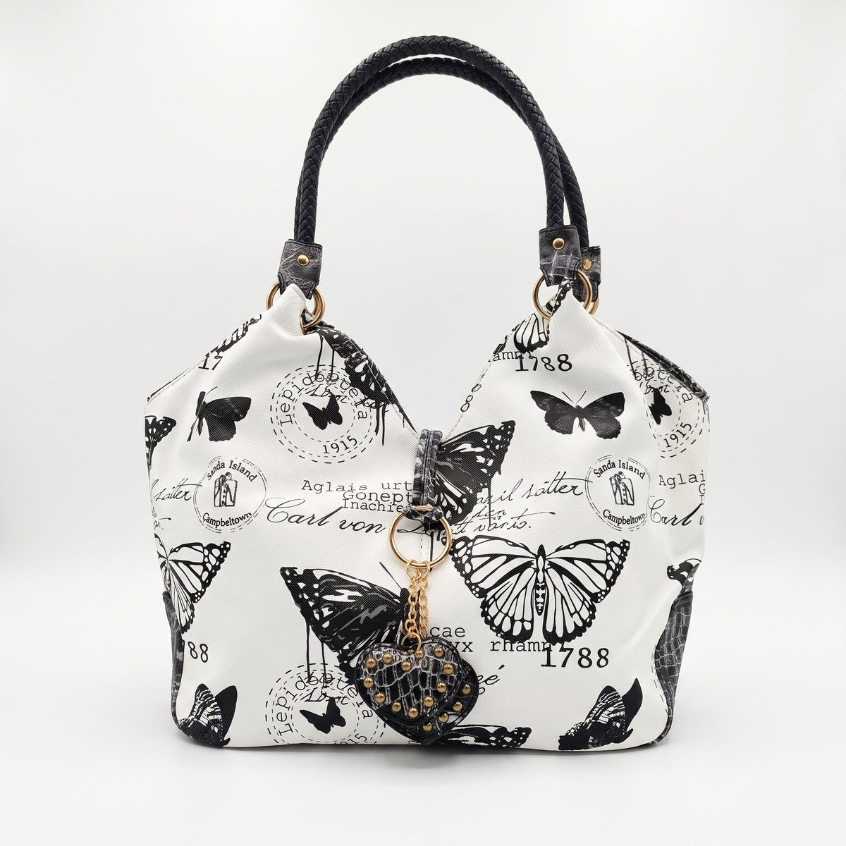 Adelina Borsa a Mano in Canvas Farfalle
