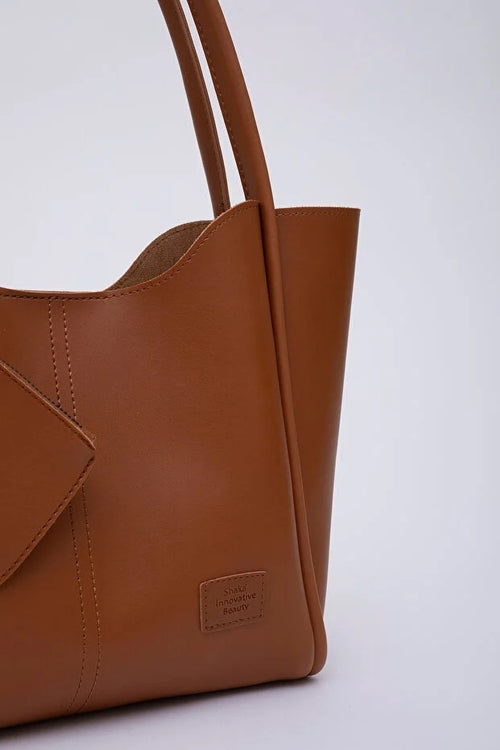 Tan SHK108 faux leather women hand and shoulder with wallet and makeup